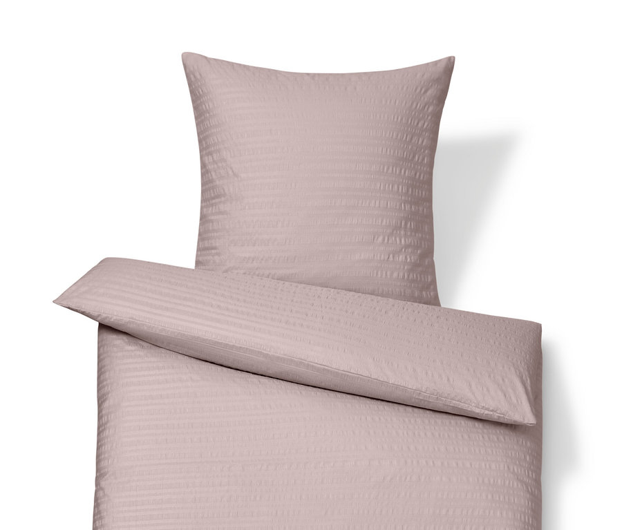 Rosafarbene Seersucker-Bettwäsche in Normalgröße und Übergröße.