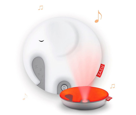 Weißes Zazu Nachtlicht »Emmy der Elefant« mit rotem Licht und Musiknoten.