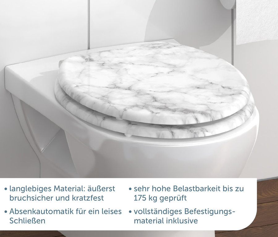 Detail einer weißen Toilette mit einem SCHÜTTE MDF-WC-Sitz »MARMOR STONE« in Marmoroptik.