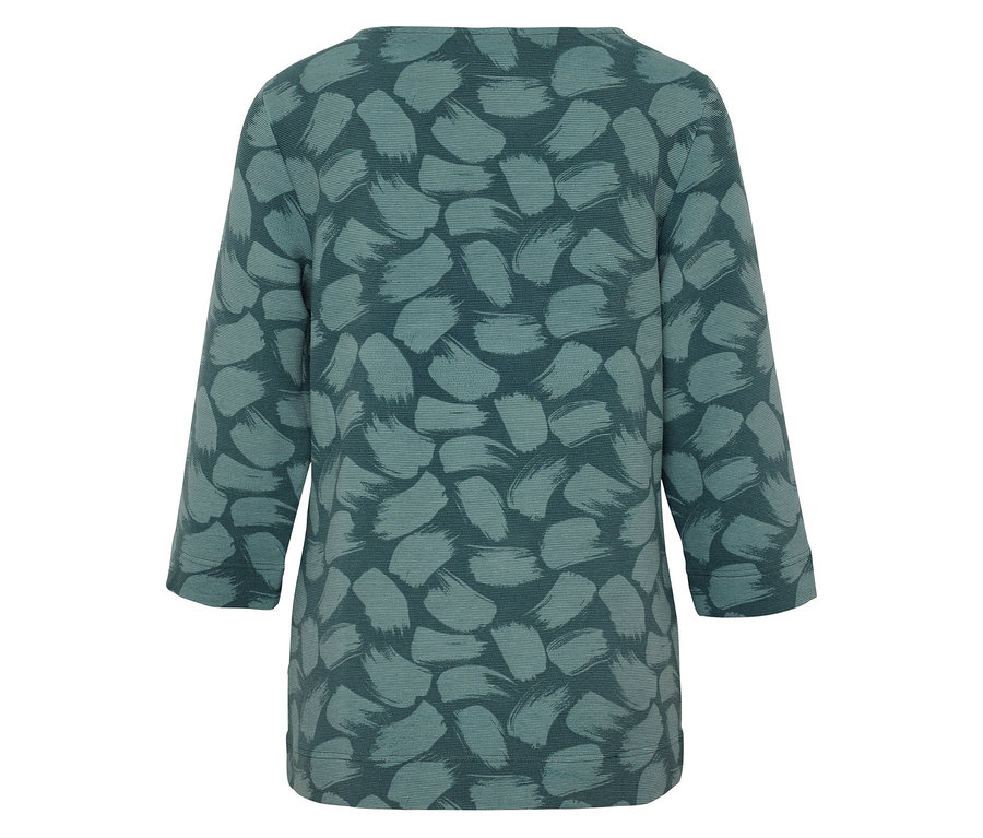 Rückansicht einer blaugrünen Bluse mit Pinselstrichmuster.
