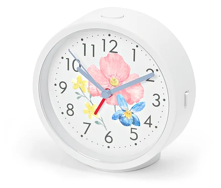 Wecker mit Hintergrundbeleuchtung, Ziffernblatt mit Blumenmuster.