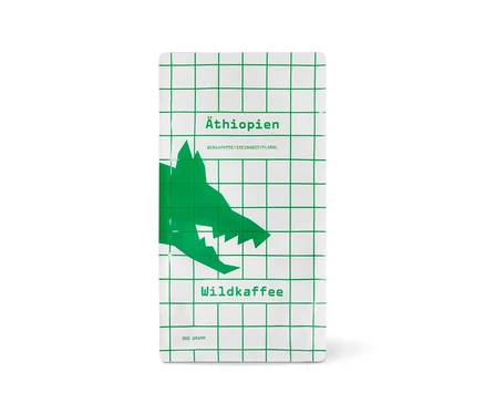 Weiße Packung Wildkaffee Äthiopien West Arsi Omni-Roast mit grünem Gittermuster und Wolfskopf, 350 g Ganze Bohne.