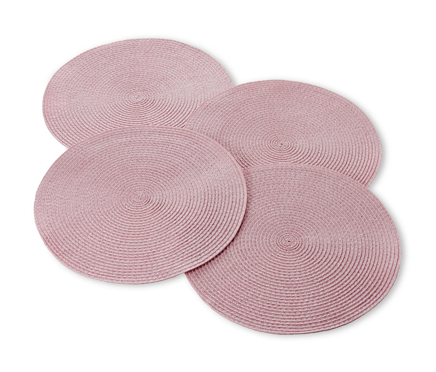 Vier rosa Platzsets.