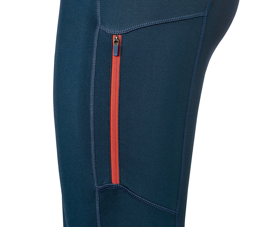 Detailaufnahme einer Sporttight mit orangefarbenem Reissverschluss.