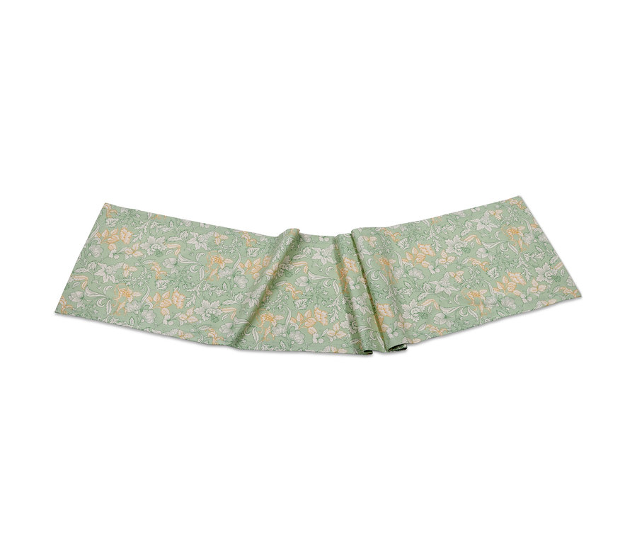 Ein Tischläufer mit Blumenmuster.