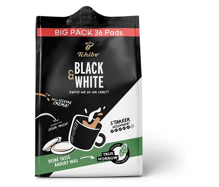 Eine Packung Tchibo Black & White mit 36 Pads. Eine Grafik einer Kaffeetasse.