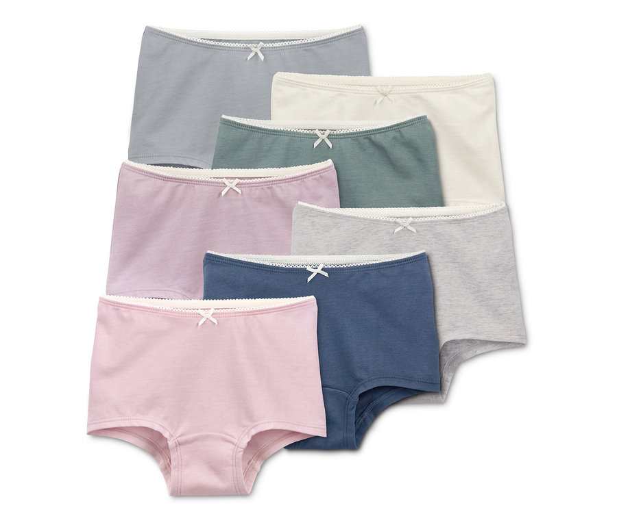 Sieben Mädchen-Pantys in verschiedenen Farben.