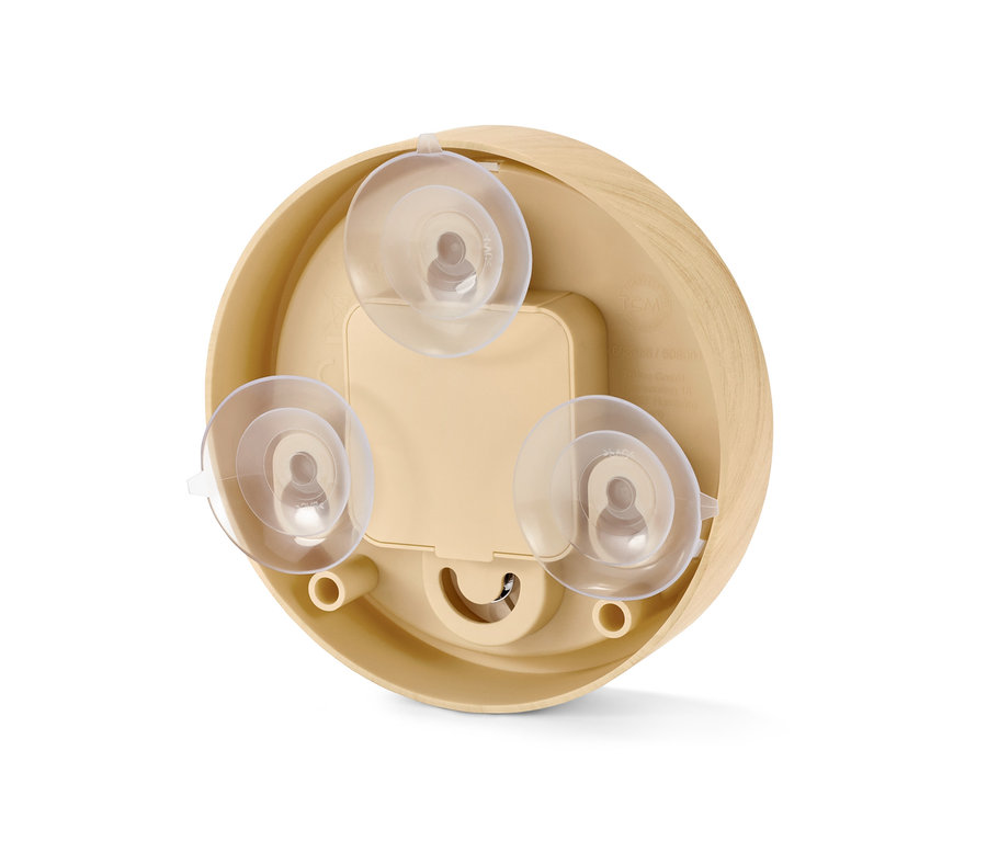 Detailaufnahme einer Badwanduhr mit Thermometer von hinten, die Saugnäpfe zeigt.