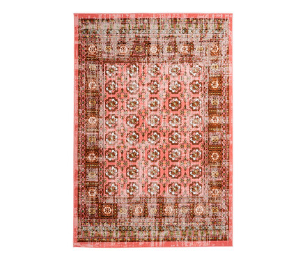 Ein roter Teppich mit Blumenmuster.