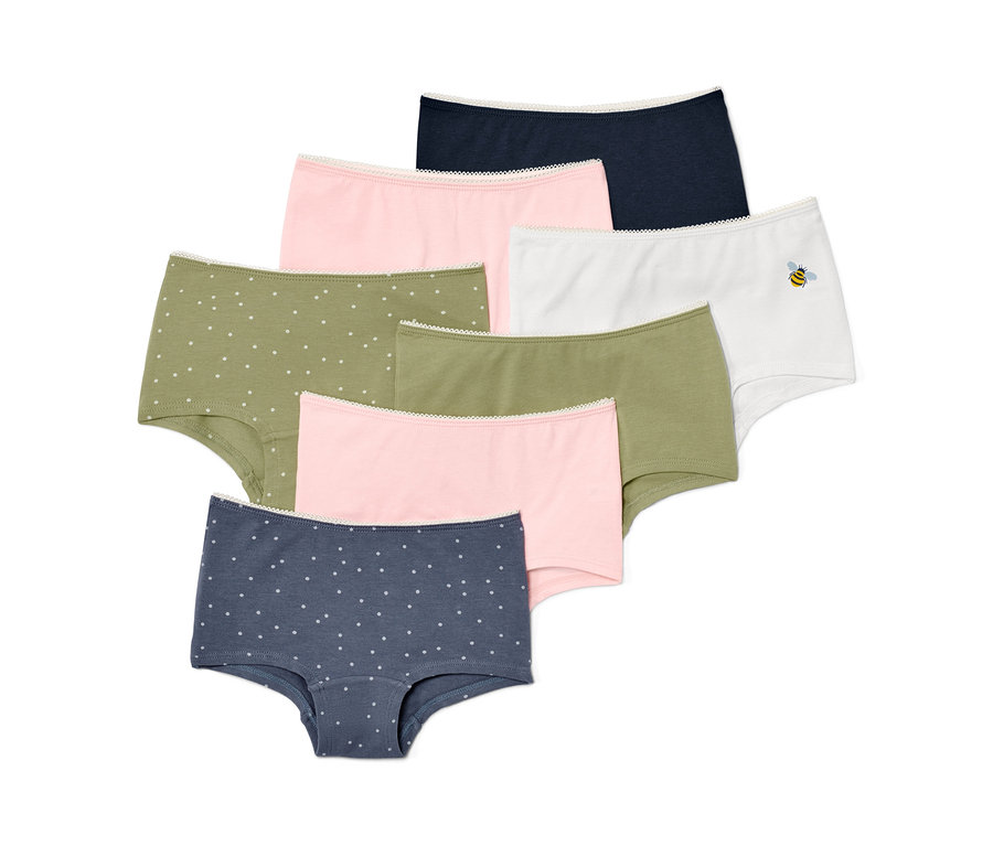 Sieben Kleinkinder-Pantys in verschiedenen Farben.