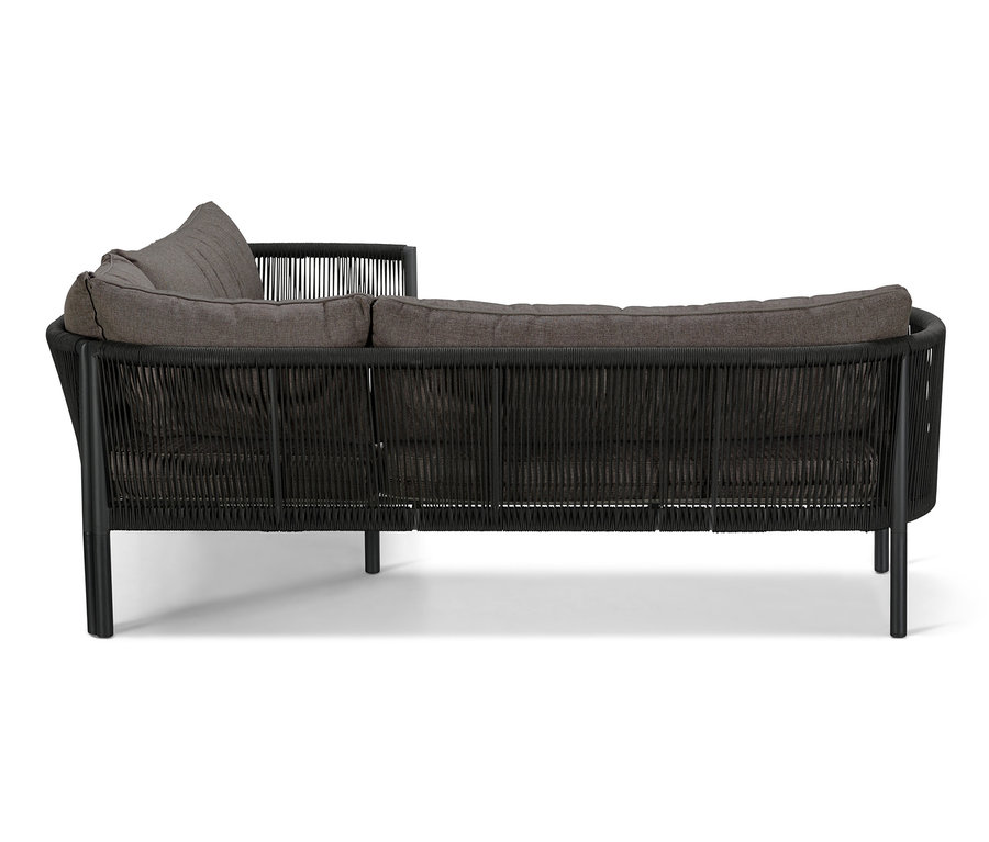 Lounge-Ecke »Jara« mit Textilgeflecht und grauen Kissen.