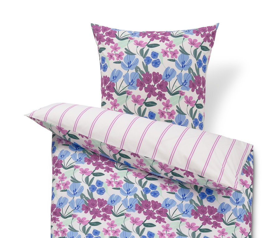 Weiss florale Renforcé-Bettwäsche in Normalgrösse und Weiss florale Renforcé-Bettwäsche in Übergrösse.