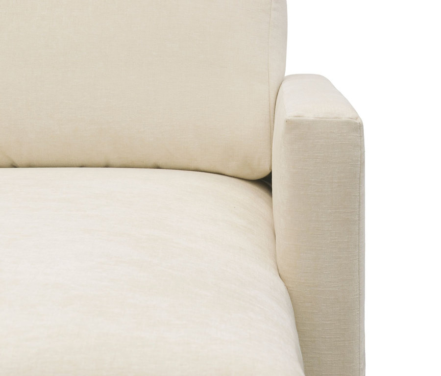 Detailansicht einer cremefarbenen DOMO Longchair, rechtsbündig.