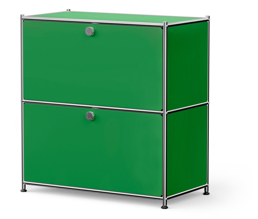 Grüner Schrank mit zwei Schubladen und silbernen Details.