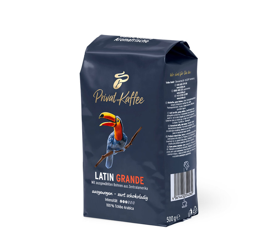 Eine Packung Privat Kaffee Latin Grande Ganze Bohne mit einem Tukan auf einem Ast.