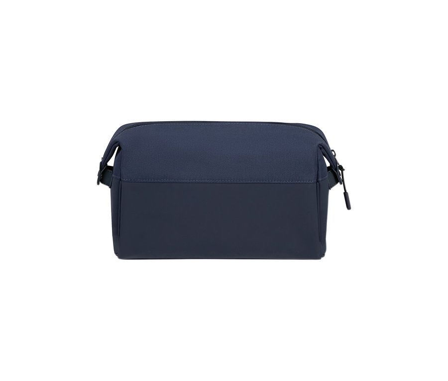 Dunkelblaue Samsonite STACKD Toilet Kit Pouch mit Reißverschluss und Schlaufen, die eine glatte und eine strukturierte Oberfläche kombiniert.