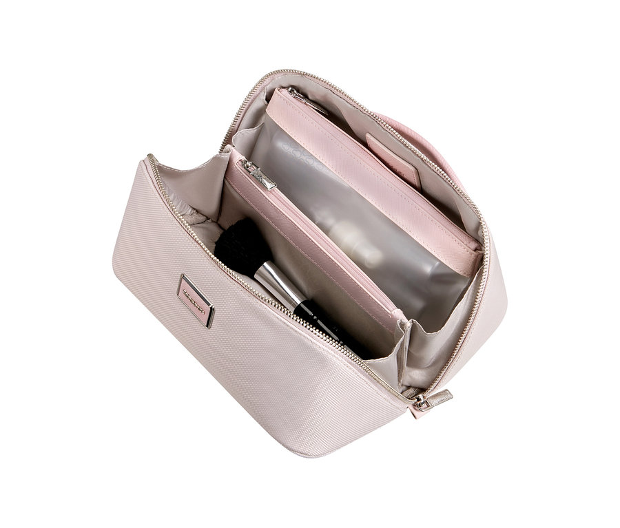 Offenes rosafarbenes Samsonite IMAGE Toilet Kit Beautycase mit mehreren Fächern, darunter ein transparentes, und einem Make-up-Pinsel.