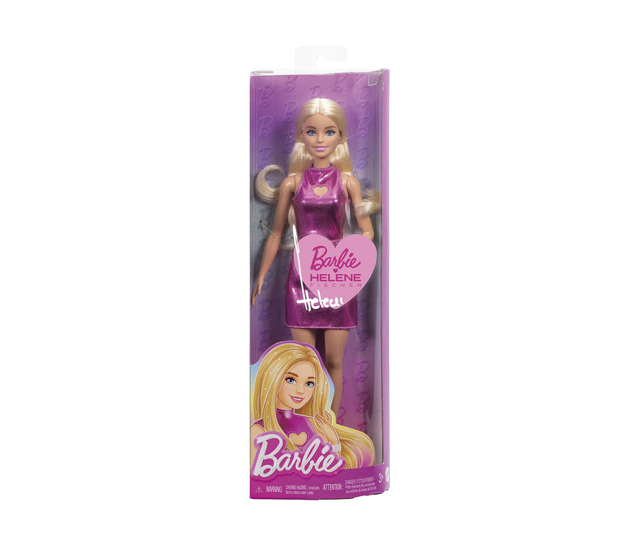 Barbie-Puppe in Verpackung mit blonden Haaren und glänzendem pinkfarbenem Kleid, auf der Schachtel steht "Barbie Helene Fischer".