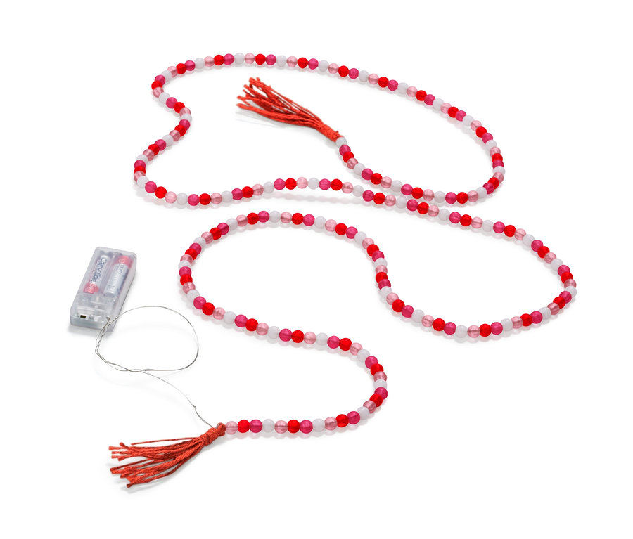 LED-Lichterkette aus roten und weißen Perlen mit Quasten.