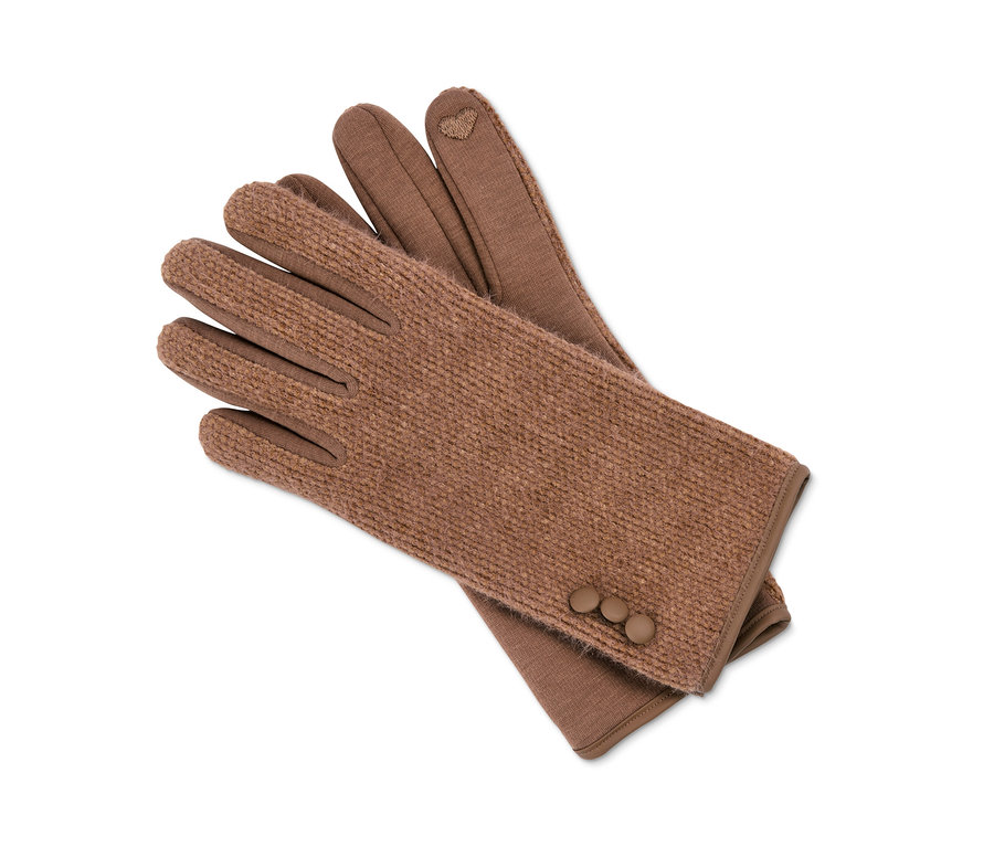 Kognacfarbene Handschuhe im Materialmix liegen übereinander.