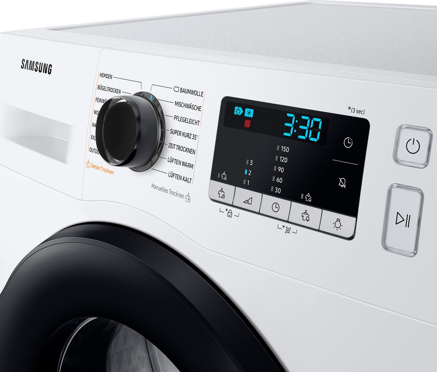 Detailansicht eines weißen Samsung-Wärmepumpentrockners »DV91TA040AE/EG« mit schwarzer Tür und einem Bedienfeld mit digitaler Anzeige, die 3:30 anzeigt.