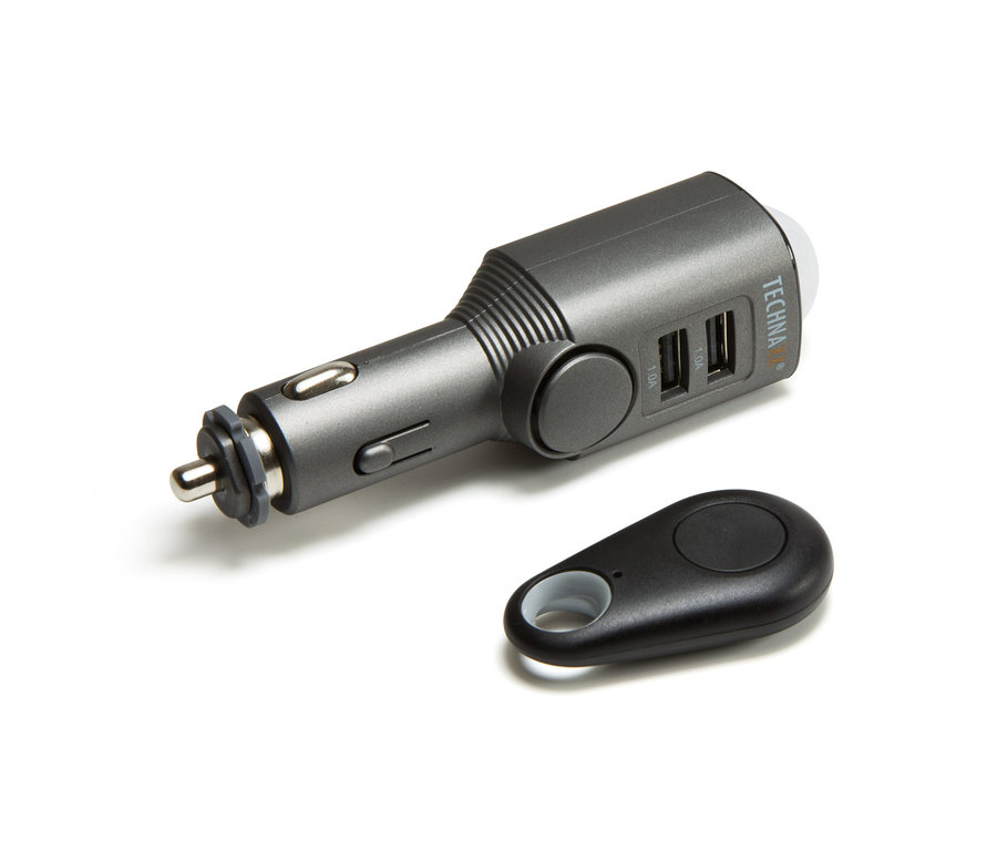 Ein grauer, mobiler Mini-Alarm mit Bewegungsmelder und ein schwarzer Schlüsselanhänger liegen auf einem weißen Hintergrund.