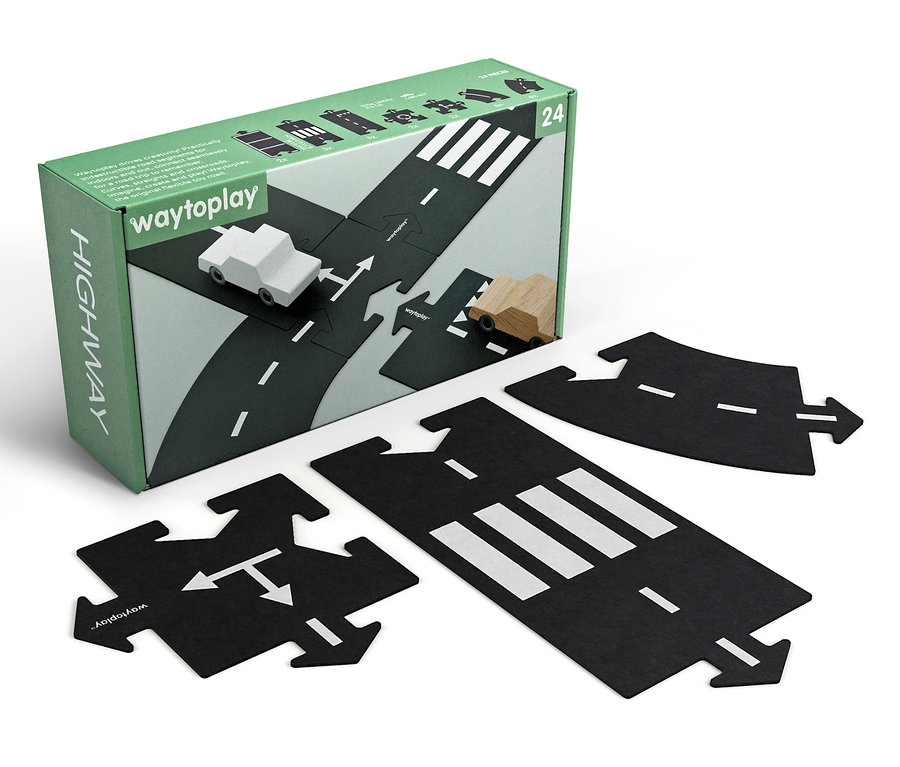 Eine Packung und mehrere Straßenteile des Waytoplay Highway mit kleinen Autos.