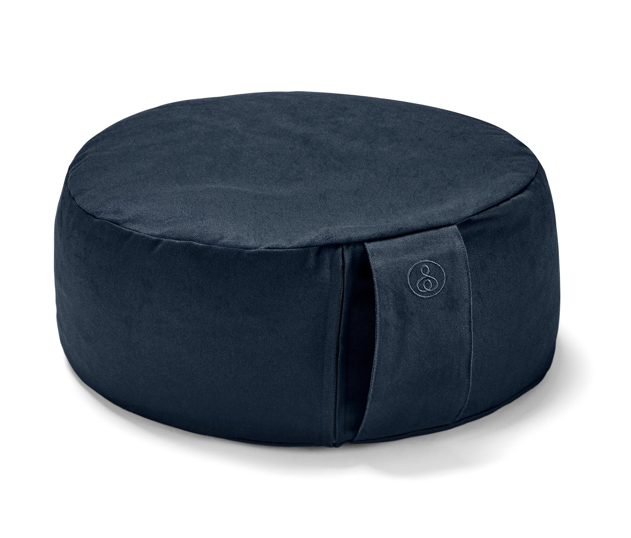 Ein dunkelblaues Meditationskissen.