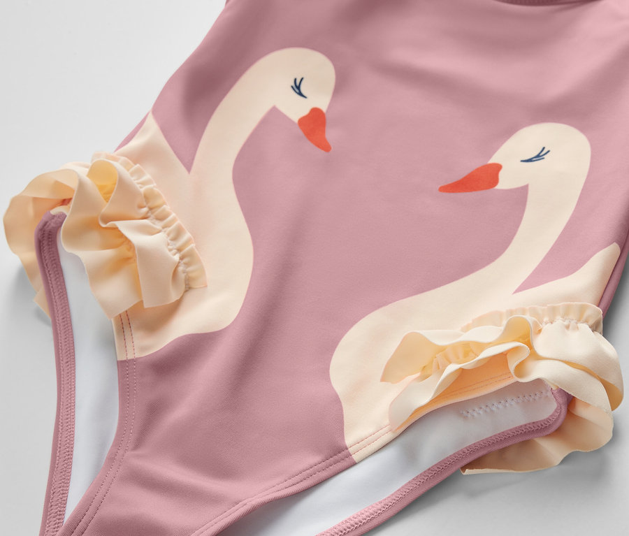 Rosa Kinder-Badeanzug mit Rüschen und Schwanenprint.