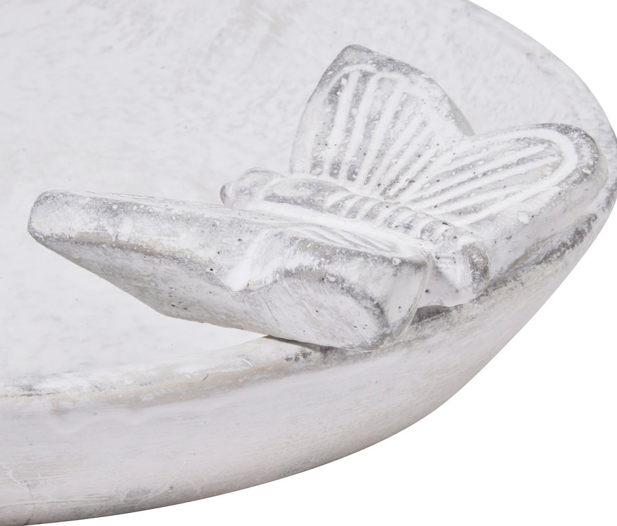 Nahaufnahme eines weißen Vogelbads und einer Insektentränke namens Foglia.