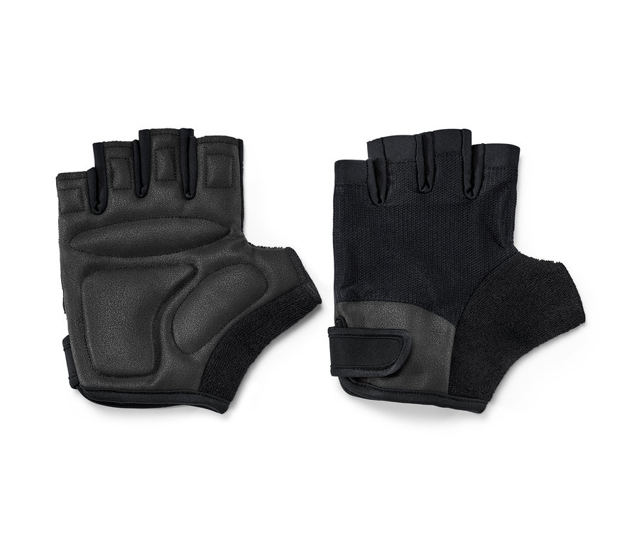 Zwei schwarze Fitness-Handschuhe liegen nebeneinander.