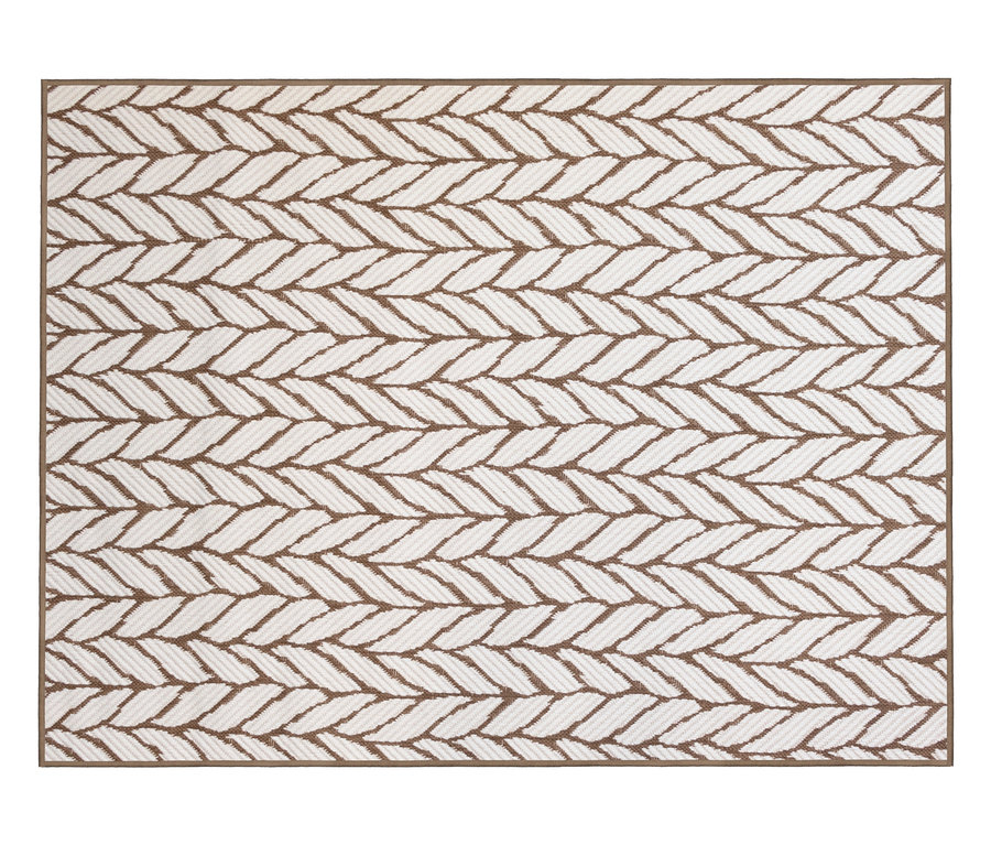 Nahaufnahme eines braunen Outdoor-Wendeppichs »Knitted Joy« mit geflochtenem Muster.