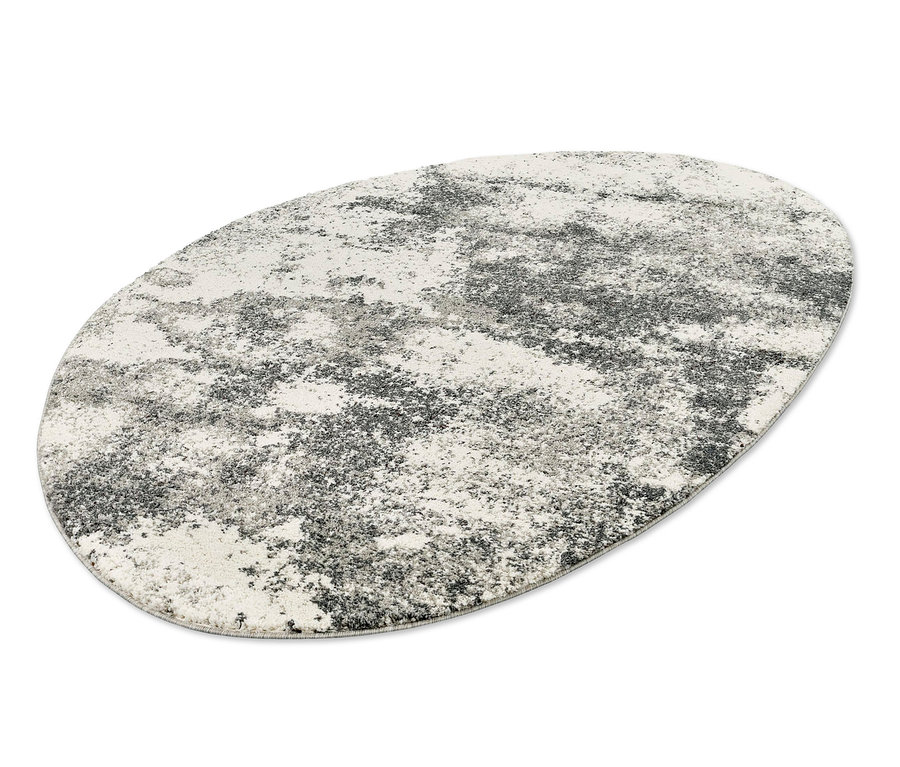 Ein weißer und grauer, gefleckter Teppich der Marke »REFLEX Stone«, ca. 160 x 230 cm.