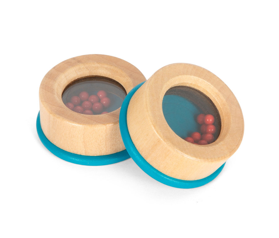 Zwei small foot Hör- und Fühl-Memo »Sensory« Spielzeuge mit roten Kugeln darin.