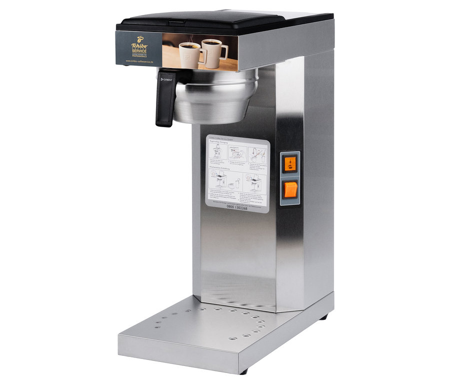 Ein silberfarbener Kaffeeautomat »Tchibo Businessline« ohne Kanne.