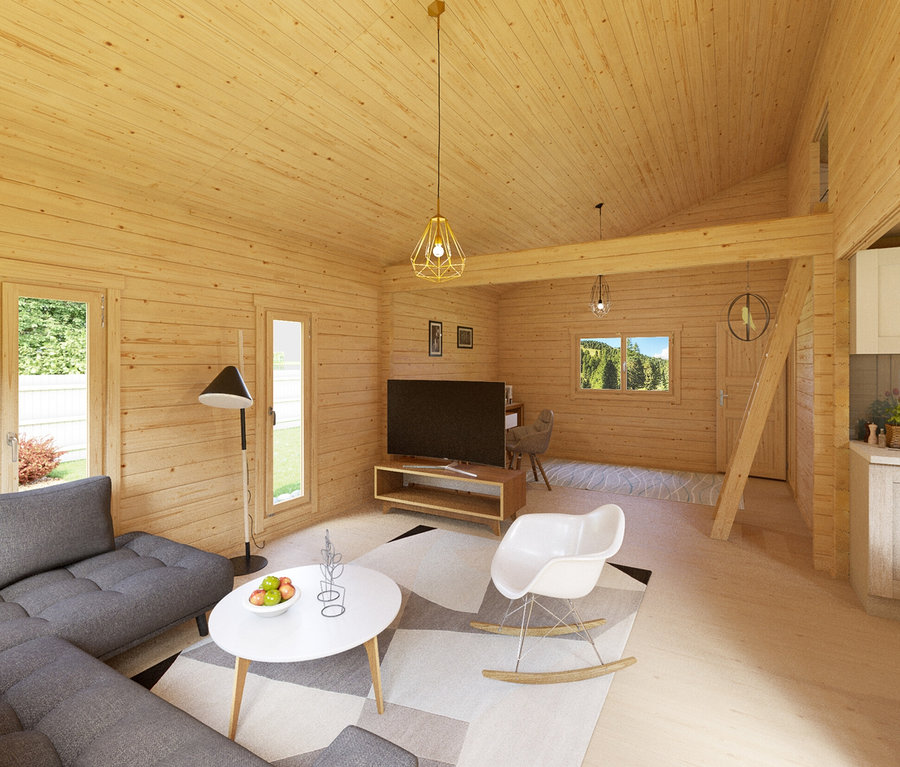 Wohnzimmer mit grauem Ecksofa, weißem Couchtisch und Fernseher im Weka Wochenendhaus mit 2 Etagen.