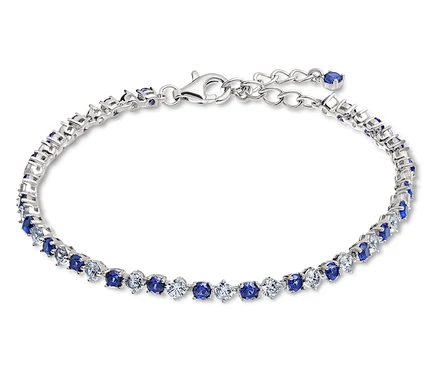 Silbernes Armband mit blauen und weißen Steinen.