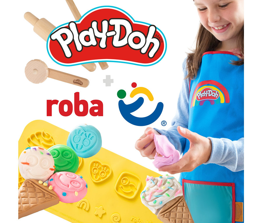 Mädchen spielt mit Play-Doh Knete und roba x Play-Doh Knet-Spielset 2.