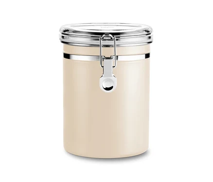 Eine Aromadose in Friendly Beige mit silberfarbenem Verschluss steht vor einem weißen Hintergrund.