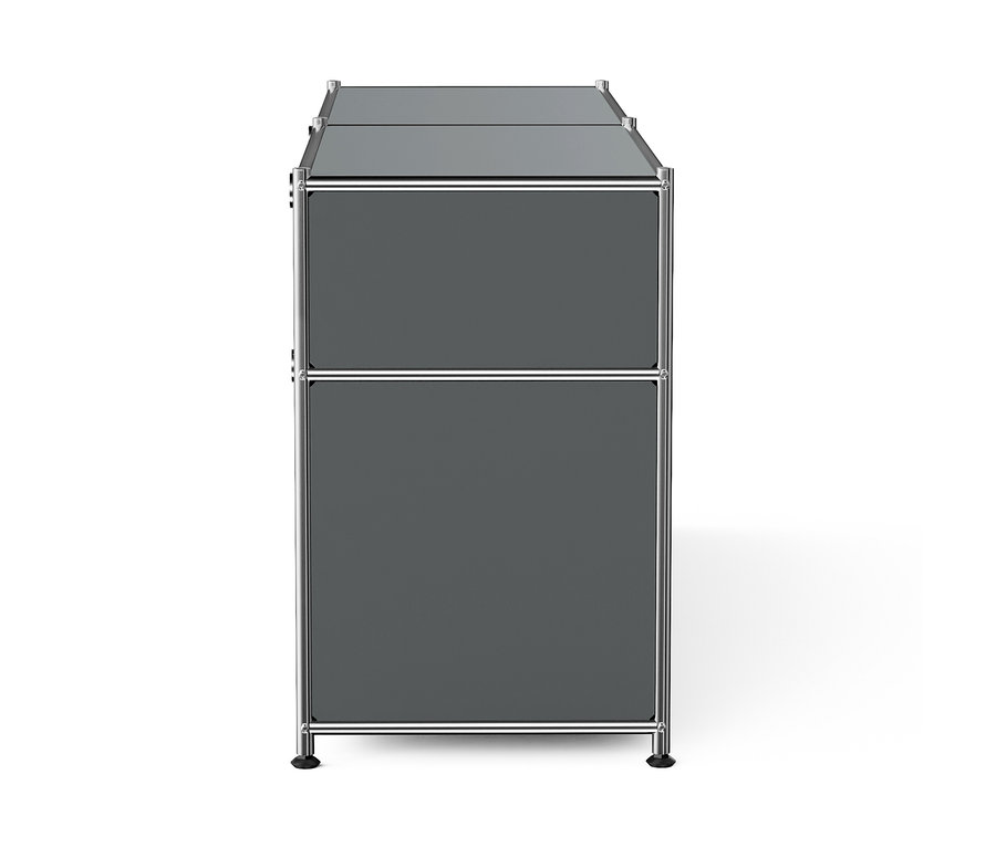Grauer Schrank mit zwei Schubladen und einem Chromrahmen.