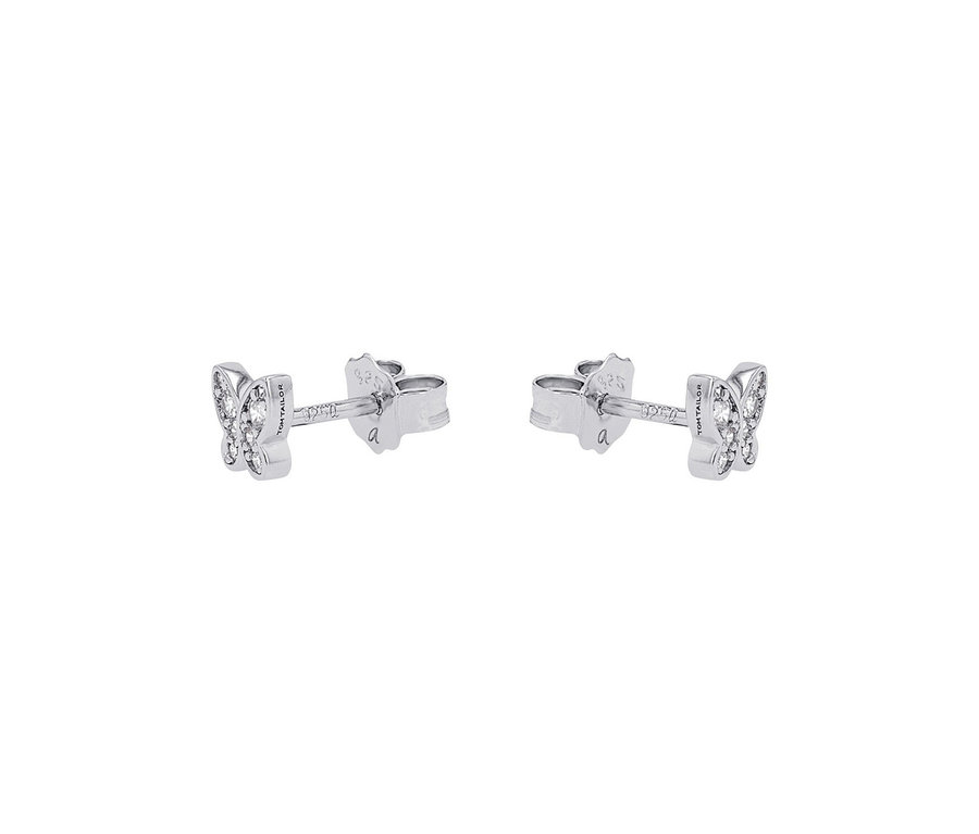 Zwei silberne Schmetterlings-Ohrstecker mit glitzernden Steinen, die Marke Tom Tailor ist auf dem Stecker sichtbar.