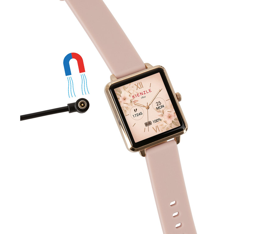 Roségoldfarbene Kienzle Smart Slim Uhr mit rosafarbenem Armband und floralem Display, daneben ein magnetisches Ladekabel.