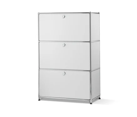 Ein weißes Metallregal mit drei Klappfächern.