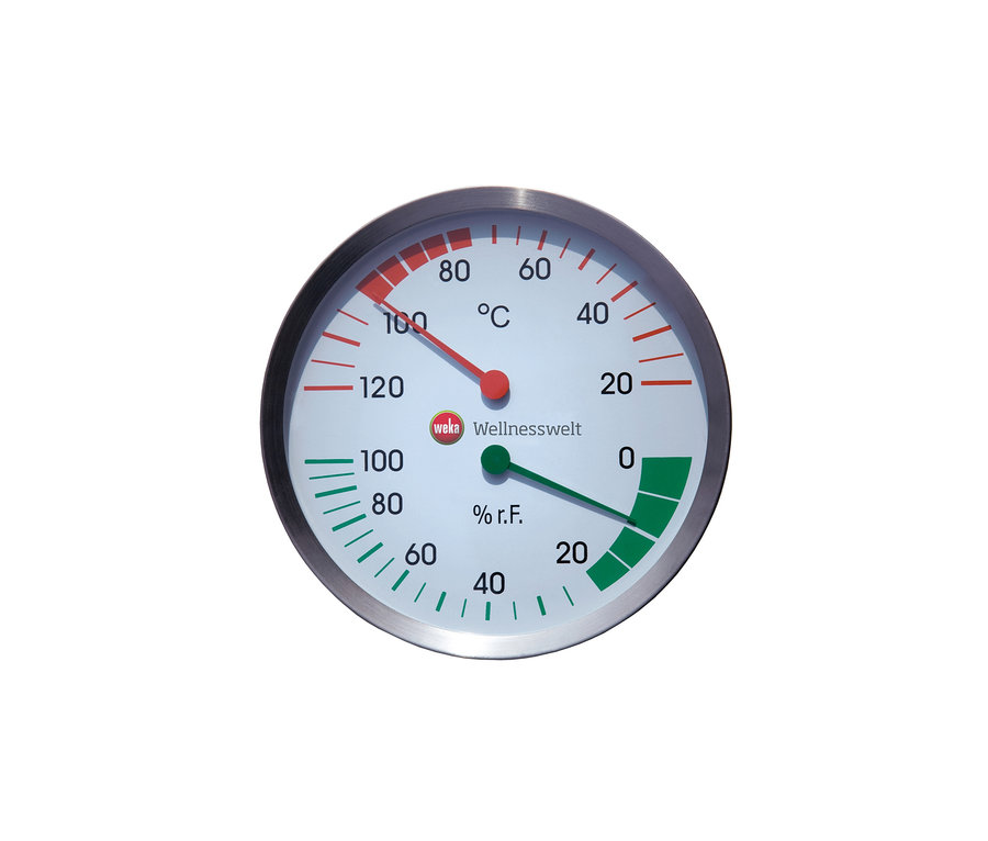 Nahaufnahme eines Weka Wellnesswelt Thermometers und Hygrometers, wobei der rote Zeiger die Temperatur und der grüne Zeiger die Luftfeuchtigkeit anzeigt.