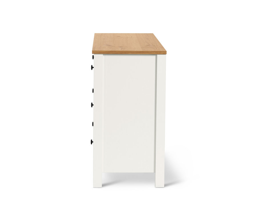 Seitenansicht einer weißen Kommode mit Schubladen.