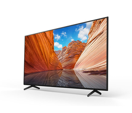 Ein schwarzer Sony KDX80JAEP Fernseher zeigt einen Canyon.