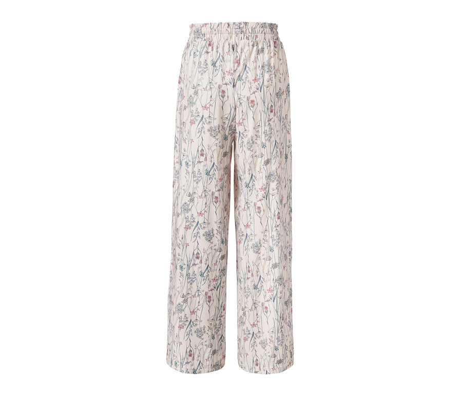 Cremefarbene Relaxhose mit Blumenmuster.