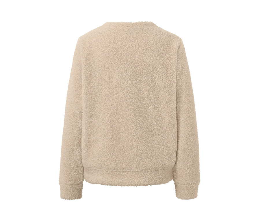 Detailansicht eines cremefarbenen Kuschel-Sweaters.