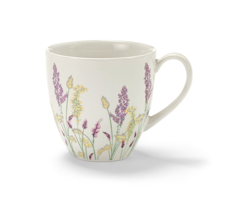 Weißer Trinkbecher mit Blumenmuster.