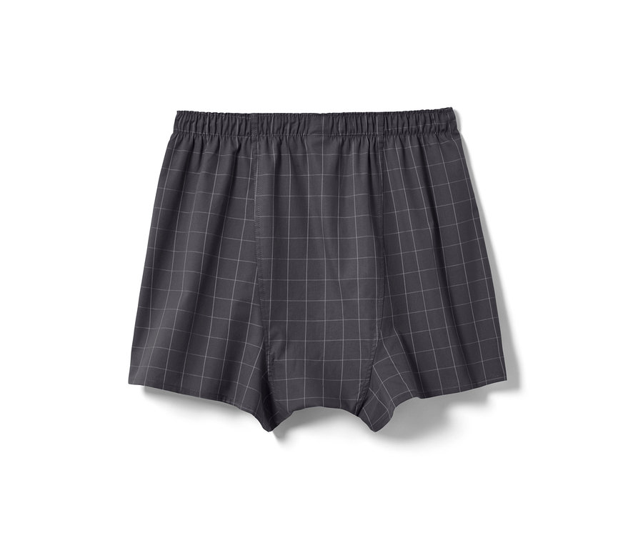 Detailaufnahme der grauen 4 Web-Boxershorts mit dezentem Karomuster.